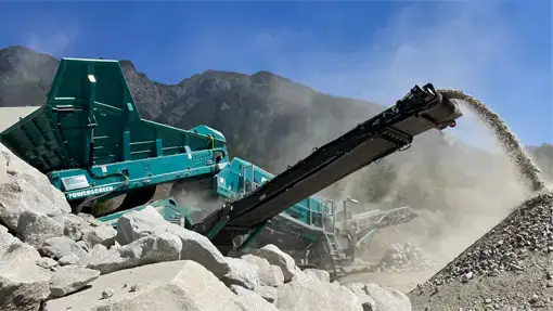 Powerscreen Warrior screeningrock and removing oversized material 