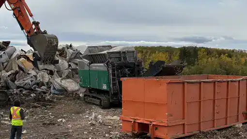 Komptech Terminator Working In A Municipal Landfill, Shredding Mattresses