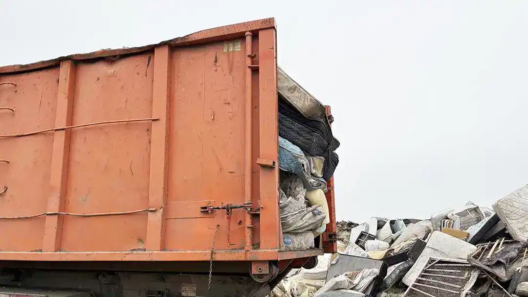 mattresses-arriving-for-processing-1080x608px A full bin load of mattresses arriving to be recycled.