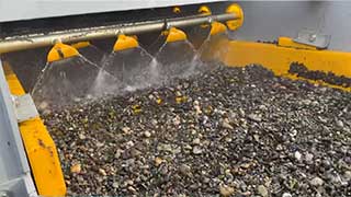Crushed stone being washed to remove contaminants