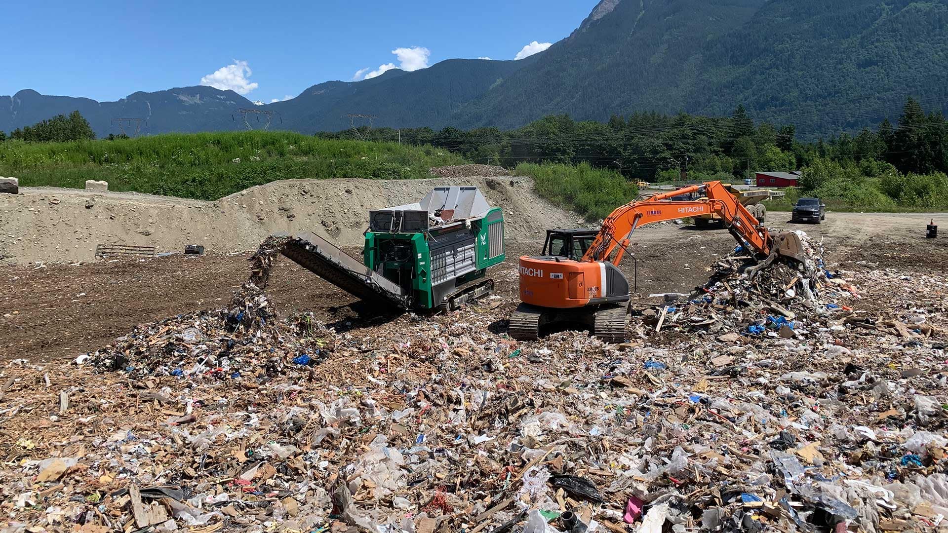 Terminator Mobile Shredder Shredding Waste at a Landfill